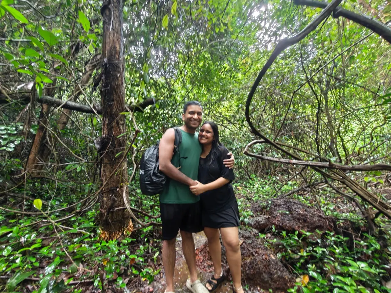 Two travellers in the rain on a Goa jungle trek